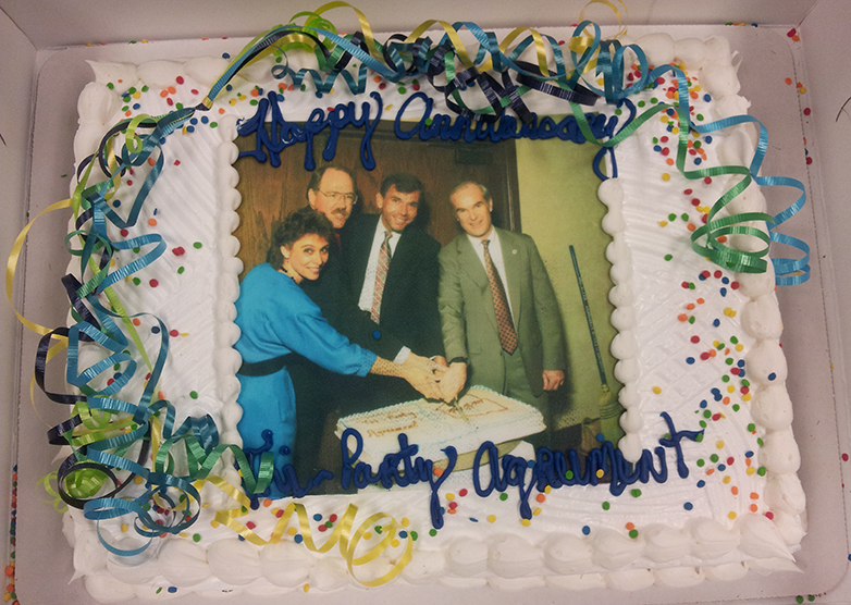 Cake topped with a photo of the original TPA signers